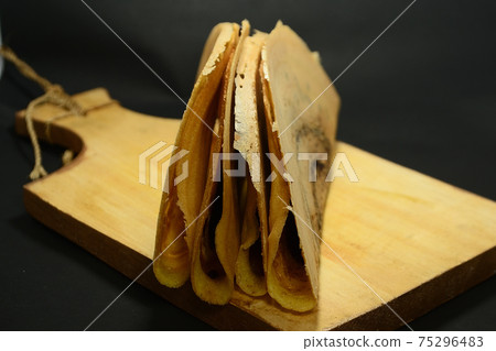 Indonesian Snacks, Leker cake. Its is  thin, sweet, semicircular and delicious 75296483