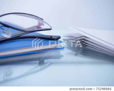 Business image · document · glasses · notebook 75296668