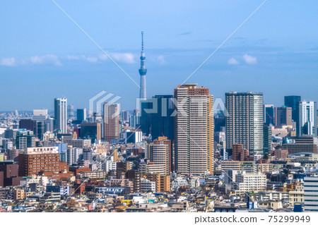 View of Tokyo cityscape of Japan, such as Tokyo Sky Tree and Tower Mansion in Shinjuku View of Tokyo cityscape of Japan, such as Tokyo Sky Tree and Tower Mansion in Shinjuku 75299949