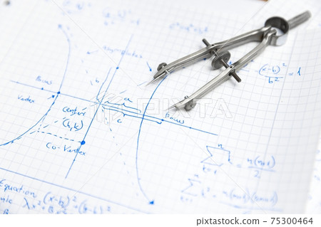 Math exersize in white notebook closeup Math exersize in white notebook closeup 75300464