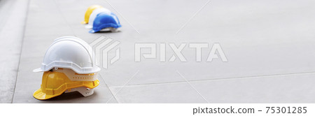 Construction hard hat safety tools equipment for workers in construction site for engineering 75301285