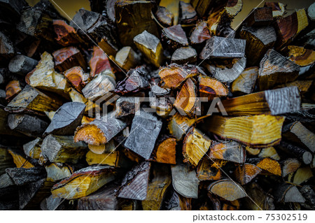 Stacked firewood (outdoor image) Stacked firewood (outdoor image) 75302519