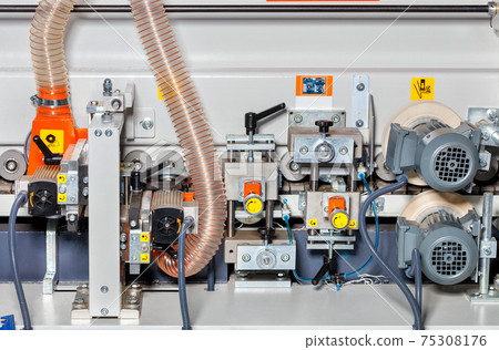 The internal structure of a modern woodworking machine with a sawdust and shavings removal system. 75308176