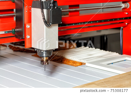 The electric spindle with a drill is installed on an automatic machine for processing wood, aluminum and plastics. 75308177