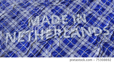 MADE IN NETHERLANDS text printed on a fabric, national textile production conceptual 3d rendering 75308692