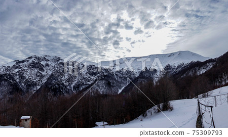Beautiful cold winter panorama of Botev peak in Bulgarian Old mountain Beautiful cold winter panorama of Botev peak in Bulgarian Old mountain 75309793