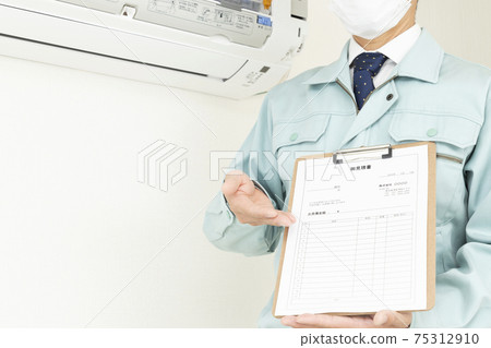 Workers inspecting air conditioners 75312910