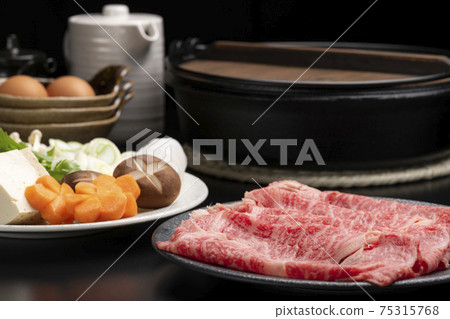 Standard sukiyaki ingredients lined up on the table Standard sukiyaki ingredients lined up on the table 75315768