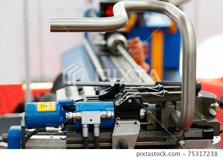 industrial CNC pipe bending machine close up 75317238