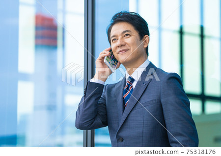 Work image of middle businessman Work image of middle businessman 75318176