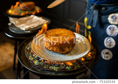 Shah's pilaf. Khan's pilaf in lavash in Azerbaijani in the restaurant. Traditional Oriental dish Shah's pilaf. Khan's pilaf in lavash in Azerbaijani in the restaurant. Traditional Oriental dish 75320534