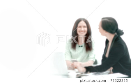 close up. business women and assistant discussing work issues in the office close up. business women and assistant discussing work issues in the office 75322255