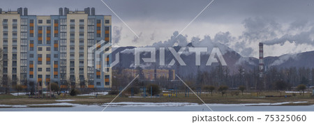 Residential buildings on the background of industrial production Residential buildings on the background of industrial production 75325060