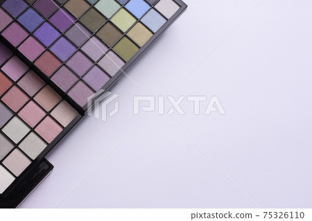 Colorful bright eye shadows. Professional multicolor eyeshadow palette. mock up Colorful bright eye shadows. Professional multicolor eyeshadow palette. mock up 75326110