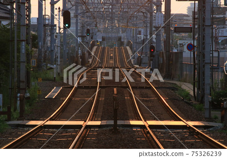 Dawn railroad track near Hanshin Uchide Station Dawn railroad track near Hanshin Uchide Station 75326239