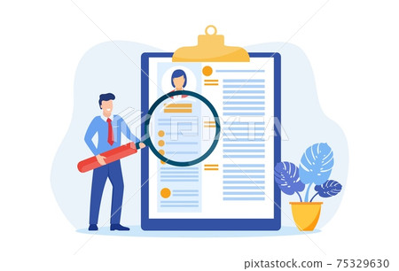 HR manager looking through a magnifying glass 75329630