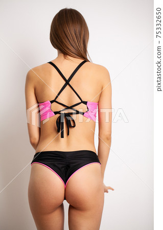 Young beautiful fashion girl wearing swimwear swimsuit 75332650