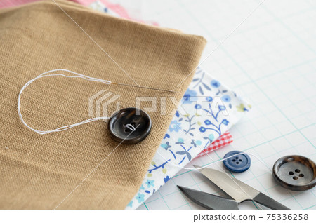 Button attachment 75336258