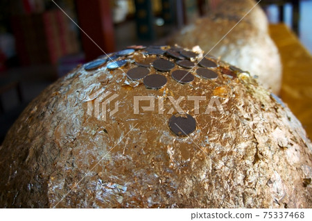 Coin donation Boundary stones blessing at Thailand Buddhist temple Coin donation Boundary stones blessing at Thailand Buddhist temple 75337468