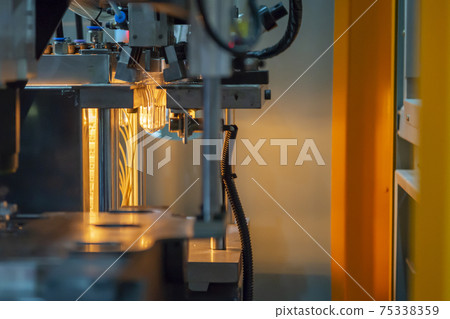 The preform shape of PET bottle in the blowing mold machine.  75338359