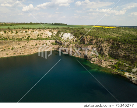 Radon Lake near Southern Bug river in Mihiia village, Ukraine 75340277