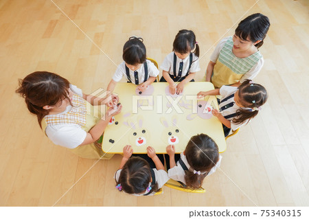 Children working in a nursery school Children working in a nursery school 75340315