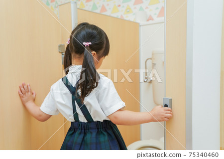 Children doing potty training in kindergarten Children doing potty training in kindergarten 75340460