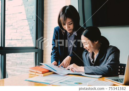 Business People Planning Strategy Analysis from financial document report, Office Concept. Business People Planning Strategy Analysis from financial document report, Office Concept. 75341382