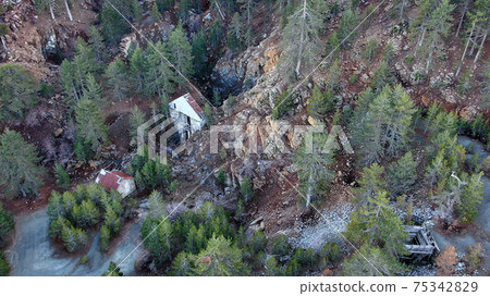 Aerial view of Kokkinorotsos abandoned chromite mine in Troodos, Cyprus Aerial view of Kokkinorotsos abandoned chromite mine in Troodos, Cyprus 75342829
