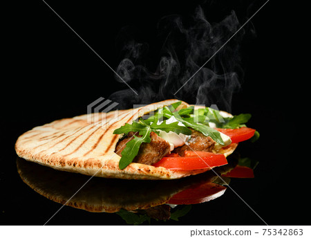 Classic tortilla wrap roll with grilled beef and Classic tortilla wrap roll with grilled beef and 75342863