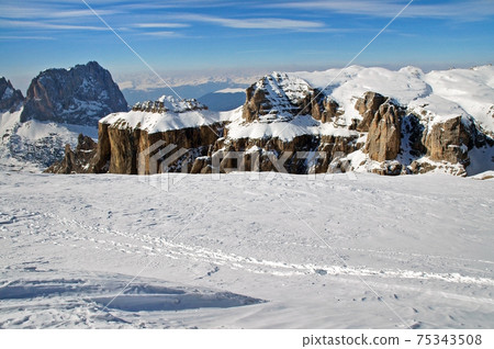 Snowy winter mountains, ski resort in Dolomites Snowy winter mountains, ski resort in Dolomites 75343508