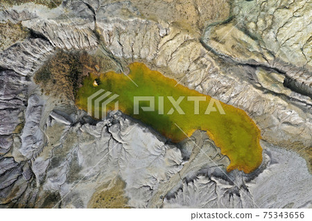Aerial view of lake in open pit mine Aerial view of lake in open pit mine 75343656
