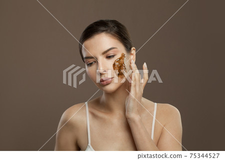 Healthy woman spa model with cosmetic oil Healthy woman spa model with cosmetic oil 75344527