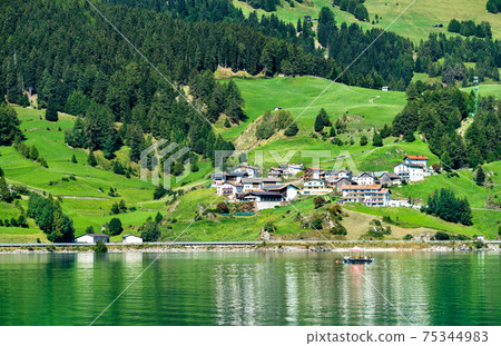 Reschensee, an artificial lake in the Italian Alps 75344983