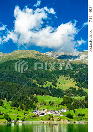 Reschensee, an artificial lake in the Italian Alps 75344984
