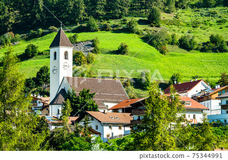 Church at Graun im Vinschgau or Curon Venosta, a town on Lake Reschen in South Tyrol, Italy Church at Graun im Vinschgau or Curon Venosta, a town on Lake Reschen in South Tyrol, Italy 75344991