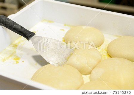 Fresh dough balls made for cooking pizza Fresh dough balls made for cooking pizza 75345270