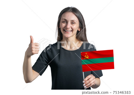 Happy young white woman holding flag of Transnistria and shows the class by hand isolated on a white background Happy young white woman holding flag of Transnistria and shows the class by hand isolated on a white background 75346383