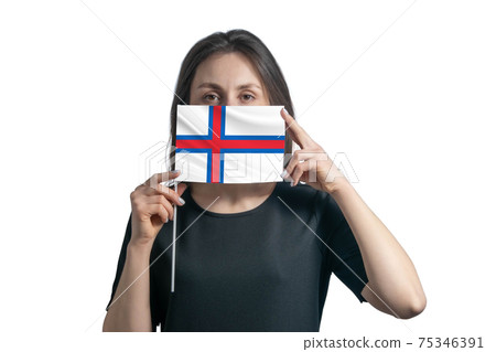 Happy young white woman holding flag Faroe Islands flag and covers her face with it isolated on a white background Happy young white woman holding flag Faroe Islands flag and covers her face with it isolated on a white background 75346391