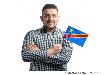White guy holding a flag of Democratic Republic of the Congo smiling confident with crossed arms isolated on a white background White guy holding a flag of Democratic Republic of the Congo smiling confident with crossed arms isolated on a white background 75347113