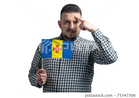 White guy holding a flag of Madeira and a finger touches the temple on the head isolated on a white background White guy holding a flag of Madeira and a finger touches the temple on the head isolated on a white background 75347306