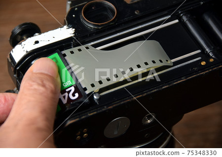 Old film camera 75348330