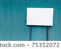 Copy space / white bulletin board (signboard) and blue background 75352072