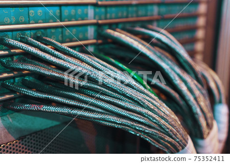 Technological wires in a metal sheath are laid in a cable channel to transmit voltage and impulses from sensors. Technological wires in a metal sheath are laid in a cable channel to transmit voltage and impulses from sensors. 75352411