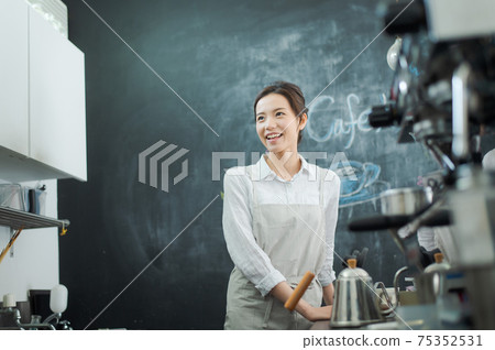 Cafe staff woman Cafe staff woman 75352531