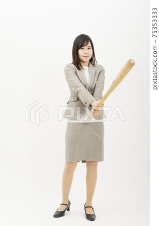 Woman in batting pose 75353333