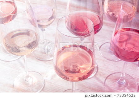 Rose wine, various styles in wineglasses Rose wine, various styles in wineglasses 75354522