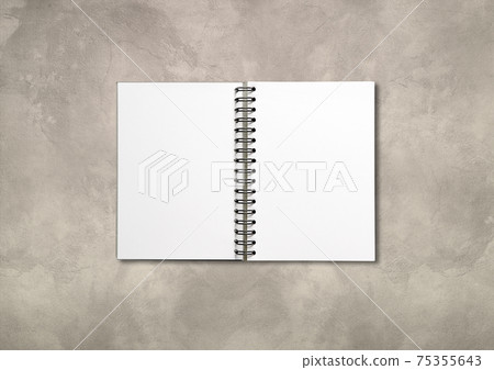 Blank open spiral notebook isolated on concrete background 75355643