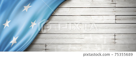 Micronesian flag on old white wall banner 75355689