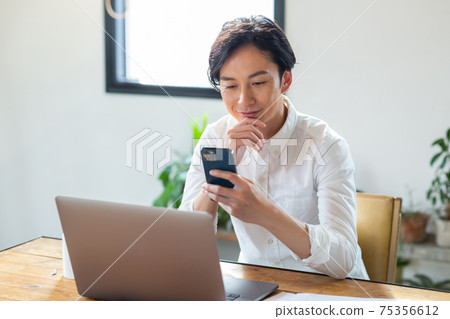 Man doing telework Man doing telework 75356612